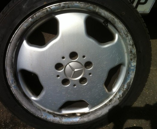 Mercedes alloy with peeling lacquer and scratches