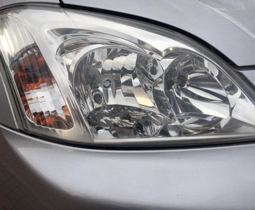 Restored headlight, Bishops Stortford, Hertfordshire